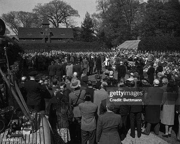 The late President Franklin Roosevelt is laid to rest in the rose garden of his Hyde Park estate. The Reverend W. George W. Anthony intones a prayer...