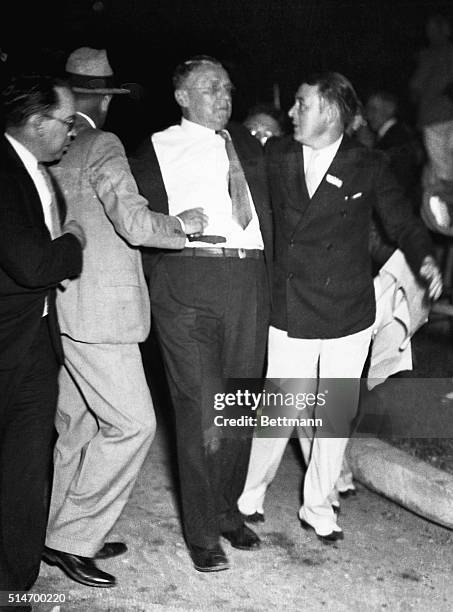 Chicago Mayor Anton J. Cermak is assisted after being wounded in an assassination attempt on President-elect Franklin Delano Roosevelt by Italian...