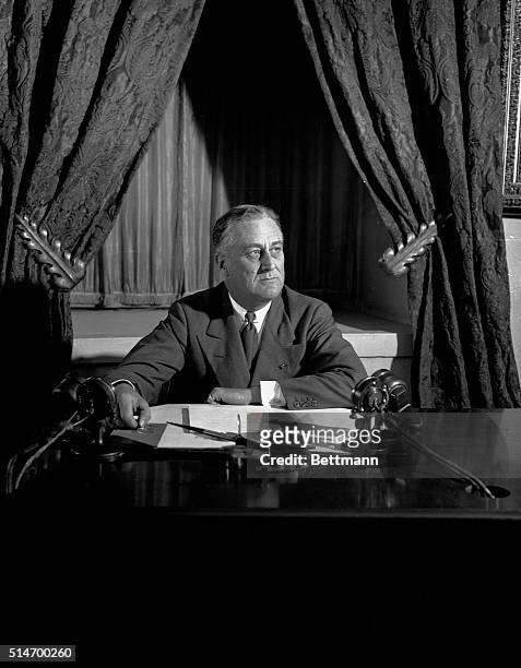 President Franklin D. Roosevelt talks over the radio, promises honest dollar. In nation wide broadcast, the President speaks from the White House, to...