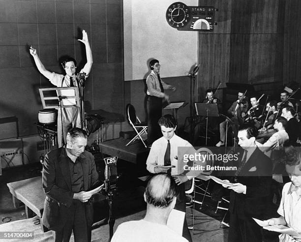 Orson Welles is seen rehearsing his radio adaptation of H.G. Wells' classic, 'The War of the Worlds', 10th October 1938. The broadcast, which claimed...