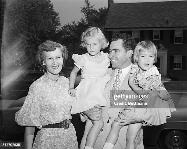 Washington, DC: Welcome Home For Daddy. Senator Richard Nixon, GOP candidate for Vice-President, gets a hug from his two daughters Julie and Patricia...