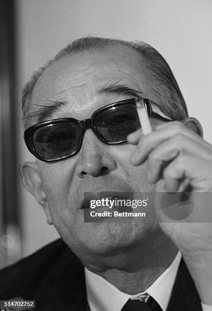 Japanese film director Akira Kurasowa talking to the press after winning an Oscar for his film Dersu Uzala.