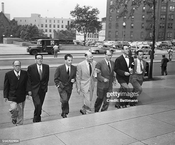 Washington, D.C.: Hollywood writers go on trial. Seven Hollywood writers and directors arrive at District Court where five will go on trial for...