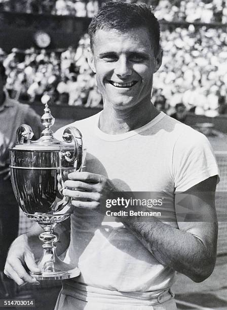 Wimbledon, England: Ted Schroeder smiles happily after winning the Wimbledon tennis championship on July 1 by downing Jaroslow Drobny of...