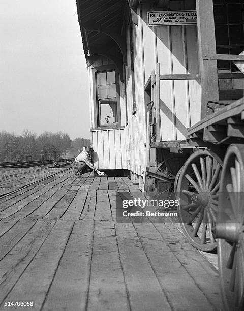 Reporters phone their offices with the news that Attorney General J. Howard McGrath had resigned. At right is United Press White House reporter,...