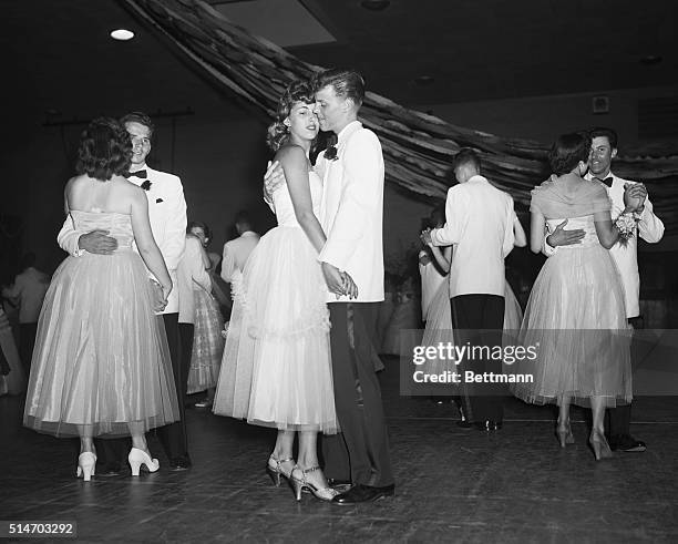 David Brandt and Ruth Estelle dance at the Senior Prom at Anacosta High School. Their double date, Barbara Belchak and Dan Knode, also dance, left. |...