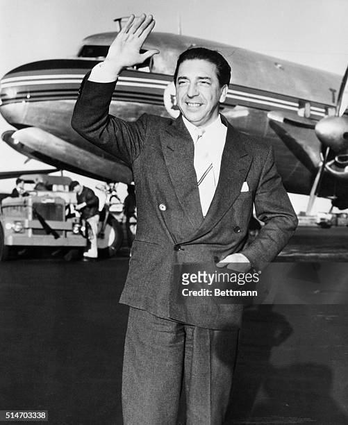 New York, NY: Mantovani, British conductor, arrives in New York 10/7/1954 from Montreal on his first visit to the United States.