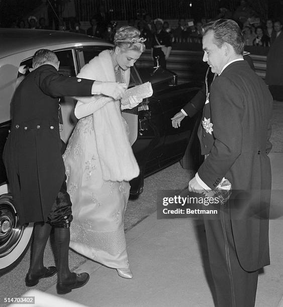 Monaco: Prince Ranier and actress Grace Kelly arrive for a gala performance at the Royal Opera House April 18th after their civil wedding ceremony...