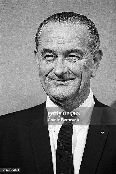 President Lyndon Johnson smiles during a White House ceremony at which he presented Young America medals for bravery and service.