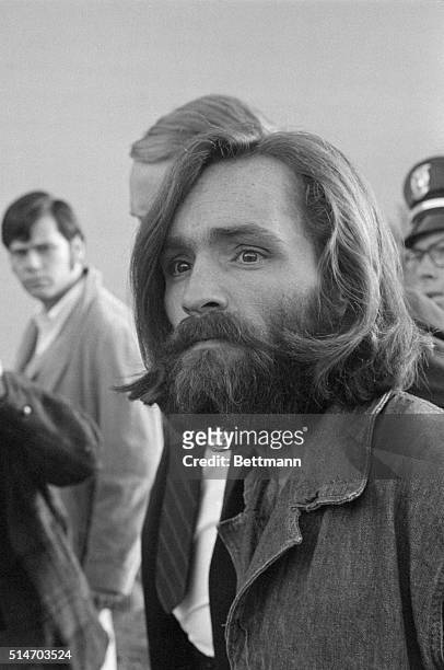 Charles Manson arrives at Inyo County Courthouse in Independence, California, for a preliminary hearing on charges of arson and receiving stolen...