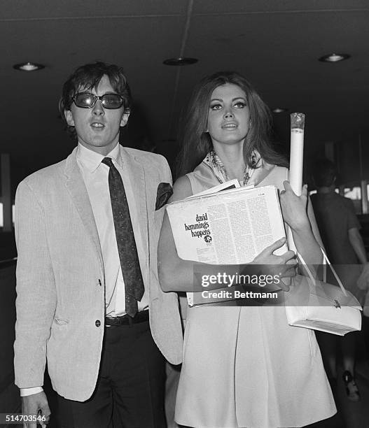 Dallas:Young British movie star david Hemmings, who came into fame in "The Blow-Up" and Fort Worth, Texas starlet Gayle Hunnicutt arrives at Dallas'...