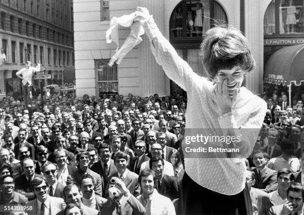 Demonstrator, Shelly Drake, removed their brassier during an anti-bra protest outside a San Francisco department store.