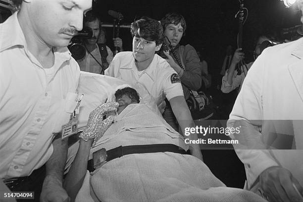 Paramedics wheel Michael Jackson into Brotman Memorial Hospital after being burned during the filming of a Pepsi commercial. Exploding fireworks set...