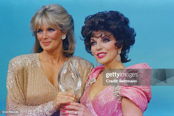 Peoples Choice Awards in Hollywood: Joan Collins with Linda Evans; Angela Lansbury; Emmanuel Lewis; Lewis with Deirdre Hall; Phylicia Ayers-Allen;...