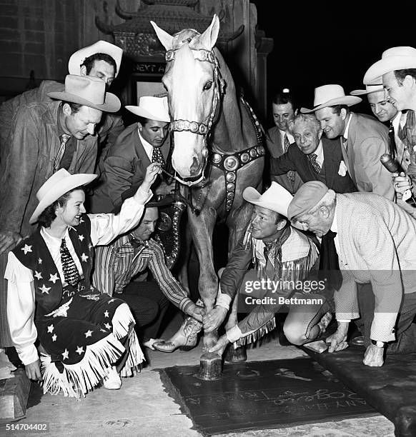 Hollywood: Roy Rogers recently became the first Western star in 22 years to be honored at Grauman's Chinese theater in Hollywood. He placed his foot...