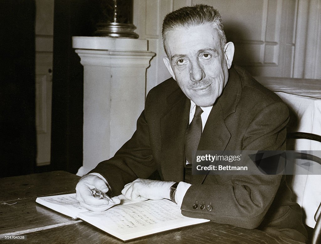 Composer Francis Poulenc Working at a Desk