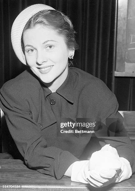 Santa Monica, CA: Actress Joan Fontaine smiles in court, Jan 25th, after she was granted a divorce from movie producer William Dozier. The actress...
