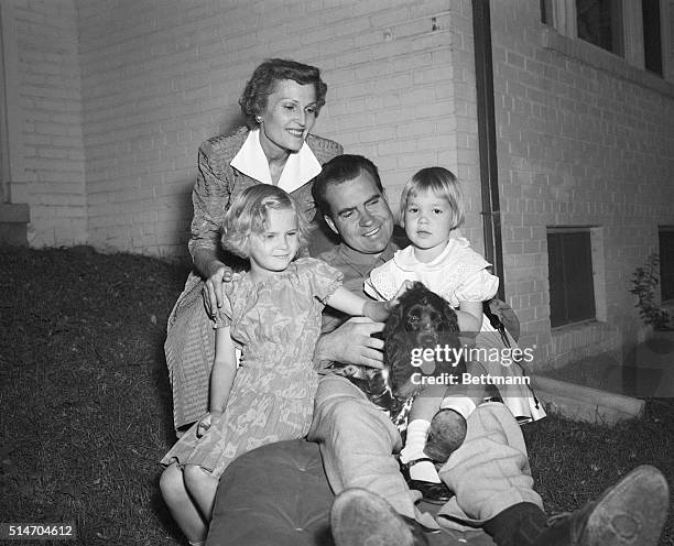 Washington, DC: Senator Richard Nixon of California takes time out from the rigors of campaigning to relax with his family at their home in...