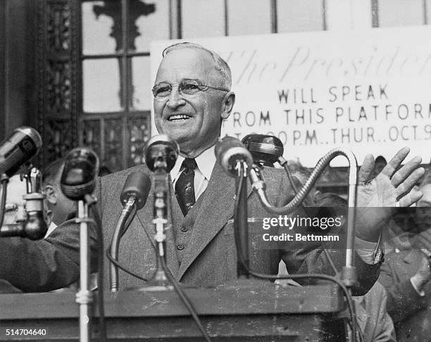 Cleveland, OH: President Truman responds with a warm smile as he is greeted by an estimated 30,000 persons in Cleveland's Public Square, Oct. 9. The...