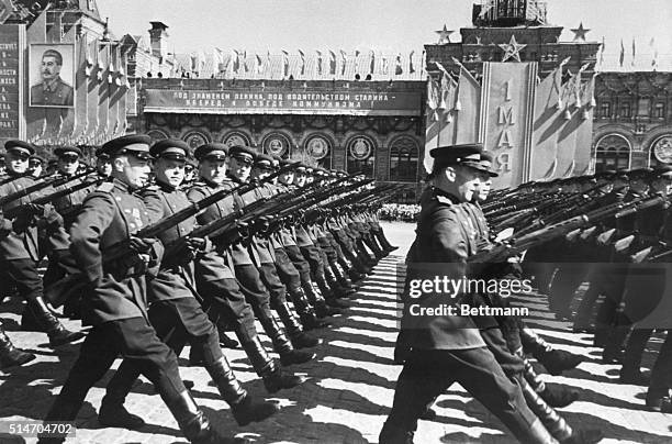 Moscow, Russia: Troops of the Moscow Garrison parade through Red Square during May Day display of Russia's armed might. The air show put on at the...