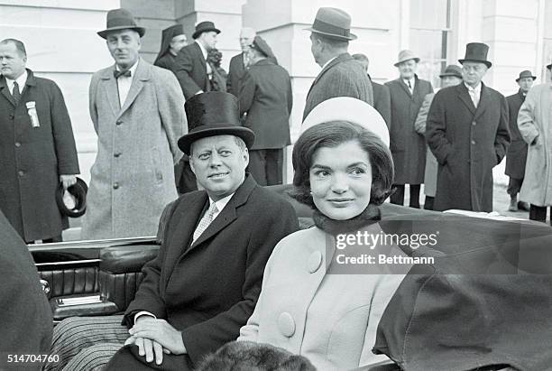 Washington, DC-MArried couple, US President John F Kennedy and First Lady Jacqueline Kennedy leave the capital building by car shortly after the...