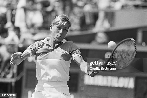 Tennis player Martina Navratilova returns a shot in the US Open at Flushing Meadow in 1983.