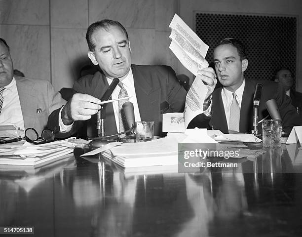 During a House Un-American Activities Committee hearing, Senator Joseph McCarthy holds up a letter purportedly written by FBI Director Hoover in 1941...