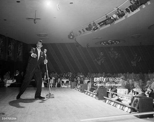 Las Vegas, Nevada: Singer Dean Martin entertaining at the Sands in Las Vegas.