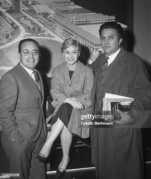 New York: On their way to Hollywood to attend the Academy Award presentations, Italian film luminaries pose together at Idlewild Airport, March 23rd,...