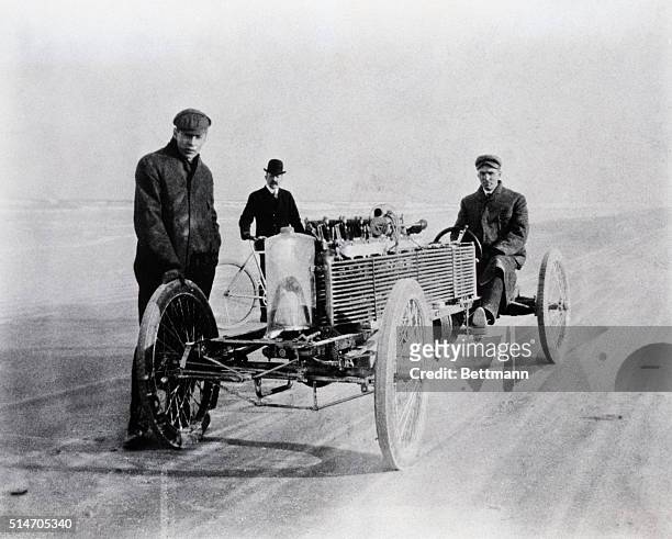 Daytona Beach, FL: Henry Ford and August Degener, an early colleague, with a special six-cylinder Ford racer at Daytona Beach, FL, in 1905. This...