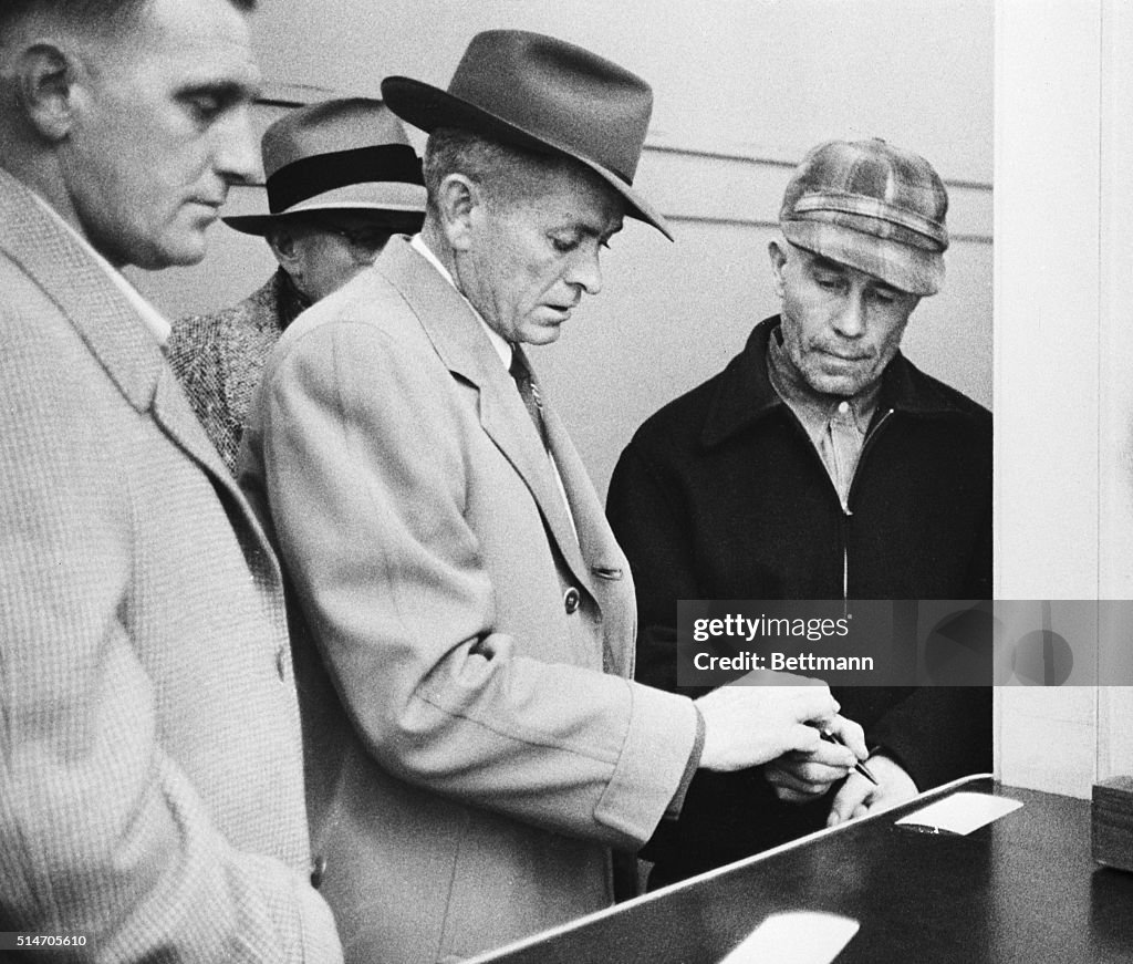 Accused Murderer Ed Gein Being Fingerprinted by Police