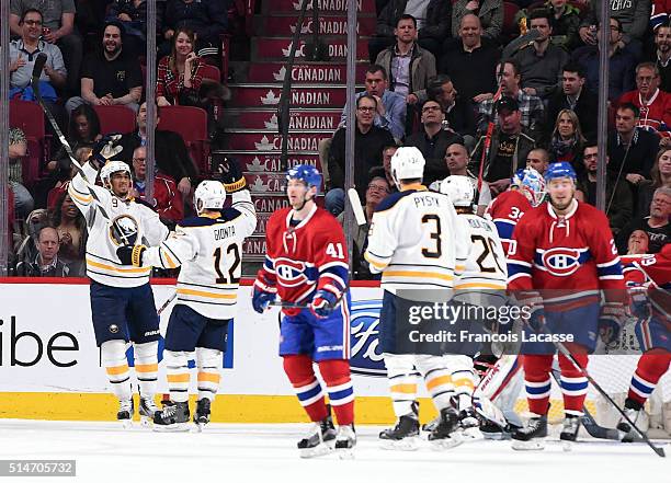 Brian Gionta of the Buffalo Sabres celebrates after scoring a goal against the Montreal Canadiens in the NHL game at the Bell Centre on March 10,...