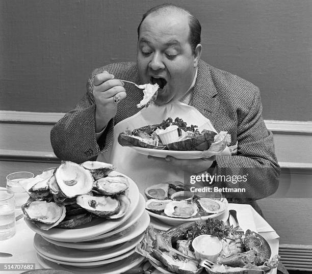 Stubby Kaye, of the Broadway musical Li'l Abner, eats huge portions of food.