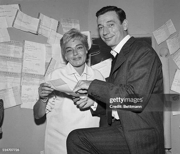 New York, NY: Telegrams decorate the walls in the dressing room of popular French entertainer Yves Montand as he and his wife, actress Simone...