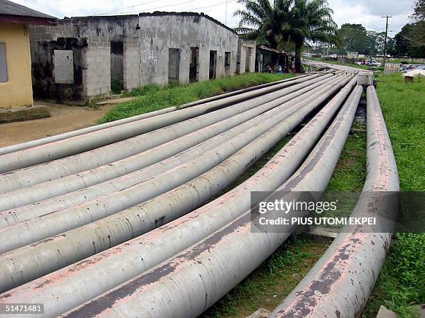 Oil pipelines are seen running through Okrika, a town in the Niger delta where a peace procession by Tom Ateke's militia, Niger Delta Vigilante...