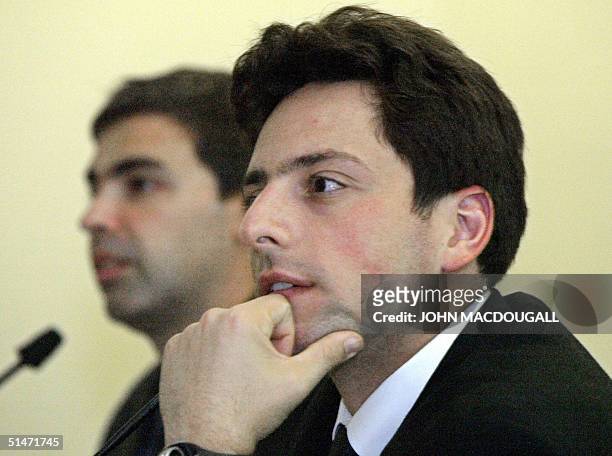 Germany: Google co-founders Sergey Brin and Larry Page address a press conference at the Frankfurt Book Fair 07 October 2004. AFP PHOTO JOHN...
