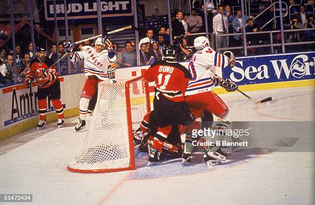 Canadian ice hockey player Stephane Matteau of the New York Rangers scores the winning goal during the second overtime period of the 7th game of the...