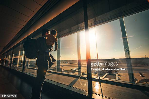 while waiting... - airport stock pictures, royalty-free photos & images