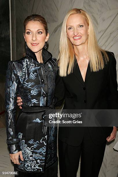 Singer Celine Dion and photographer Anne Geddes arrive at a reception to celebrate the release of their CD/book "Miracle" at Sony Music?s Sony Club...