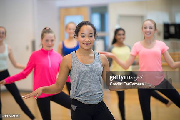 dancing together at the gym - dance studio stock pictures, royalty-free photos & images