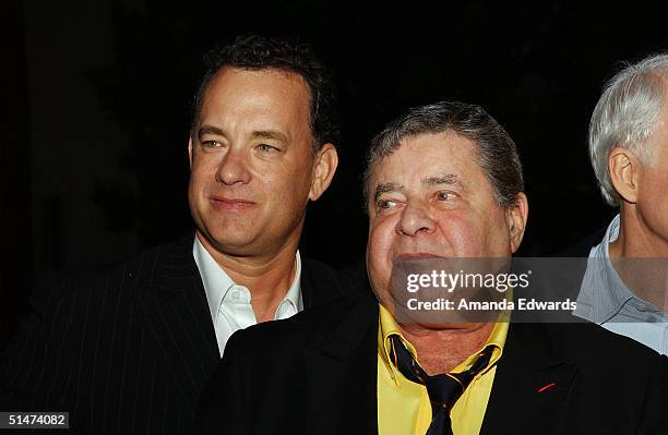 Actors Tom Hanks and Jerry Lewis arrive at a special screening of "The Nutty Professor" hosted by Jerry Lewis on October 12, 2004 at the Paramount...