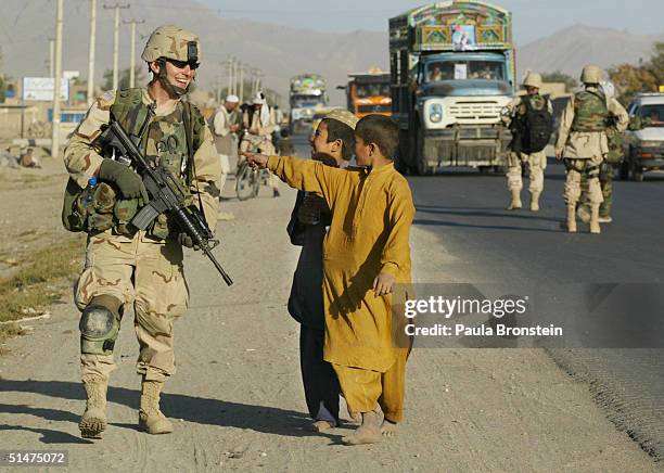 u.s. military patrols around kabul - us military helmet stock pictures, royalty-free photos & images