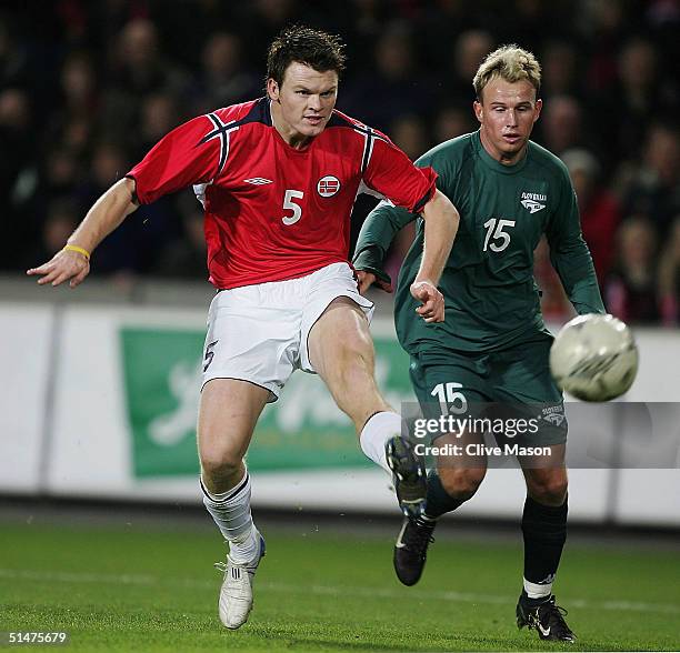 John Arne Riise of Norway gets away from Jalen Pokorn of Slovenia during the FIFA World Cup qualifying group five match between Norway and Slovenia...