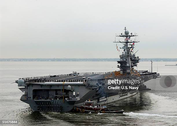 In this U.S. Navy handout, the aircraft carrier USS Harry S. Truman departs Pier 14 at Norfolk Naval Station October 13, 2004 in Norfolk, Virginia.