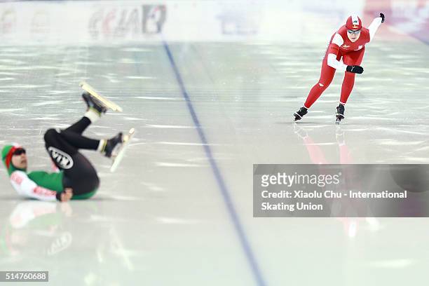 Karolina Gasecka of Poland competes in the Ladies 500m while Yevgenya Vorobyova of Belarus crashes on day one of the ISU Junior Speed Skating...