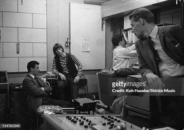 Ringo Starr, George Harrison of The Beatles and producer George Martin in the control room of Studio 2, EMI Studios, Abbey Road, London during the...