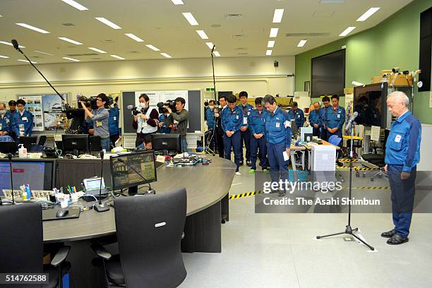 Tokyo Electric Power Co President Naomi Hirose and staffs observe a minute of silence at 2:46 pm, when the Great East Japan Earthquake struck five...