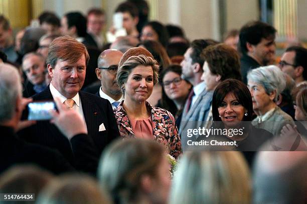 King Willem-Alexander of the Netherlands and Queen Maxima of the Netherlands arrive with Paris mayor Anne Hidalgo at the Paris city hall on March 11,...