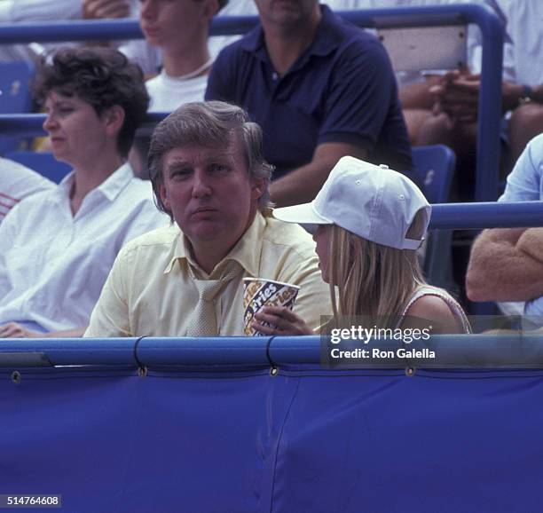 Donald Trump and Ivanka Trump attend U.S. Open Tennis Tournament on August 30, 1991 at Flushing Meadows Park in New York City.