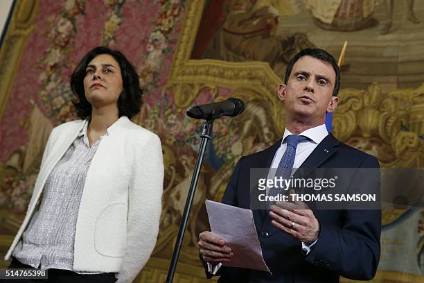 French Prime Minister Manuel Valls delivers a speech next to French Labour minister Myriam El Khomri following his meeting with students union...
